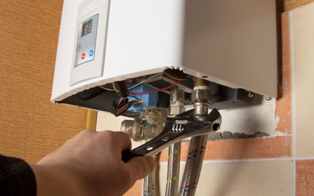 Experienced plumber performing a water filtration system installation in Highland Park, TX